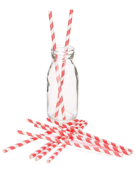 Mise en situation des pailles en carton à rayures pour fête rouges et blanches