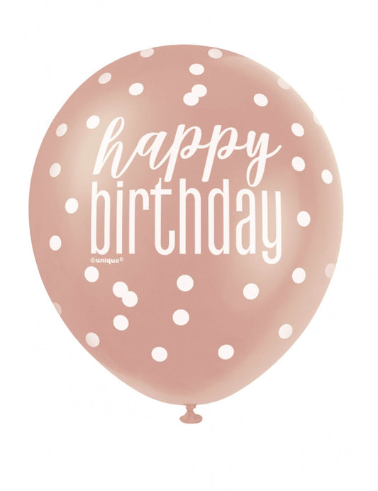 Vue de face d'un ballon en latex happy birthday à pois pour anniversaire