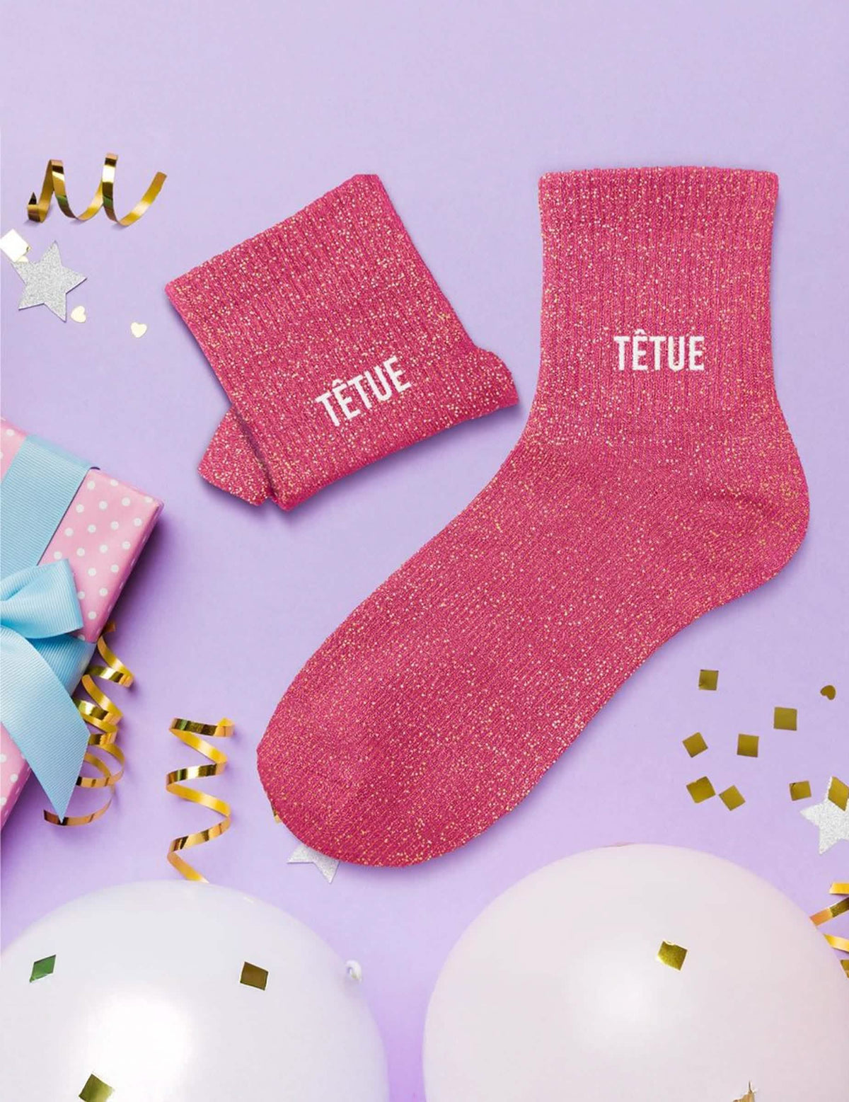 Mise en scène festive des chaussettes à paillettes Têtue pour femme