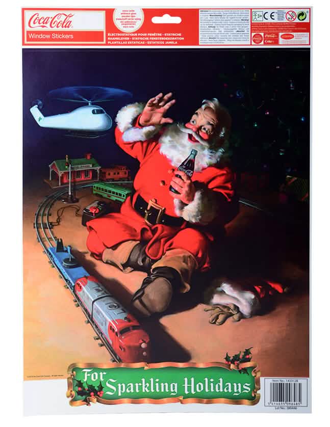 Detail vizuálu santa claus pri elektrickom vláčiku dekorácií na okná Coca-Cola™ a santa claus