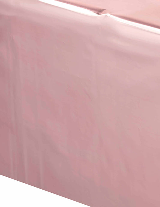 Gros plan sur la matière de la nappe en plastique rose gold pour fête