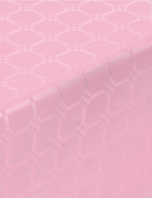Détail des motifs de la nappe en rouleau papier damassé rose pastel