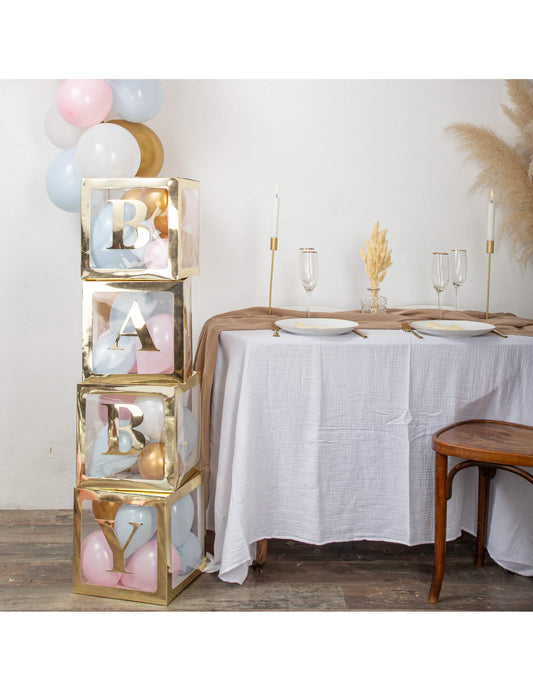 Mise en ambiance de fête des stickers baby pour baby shower dorées