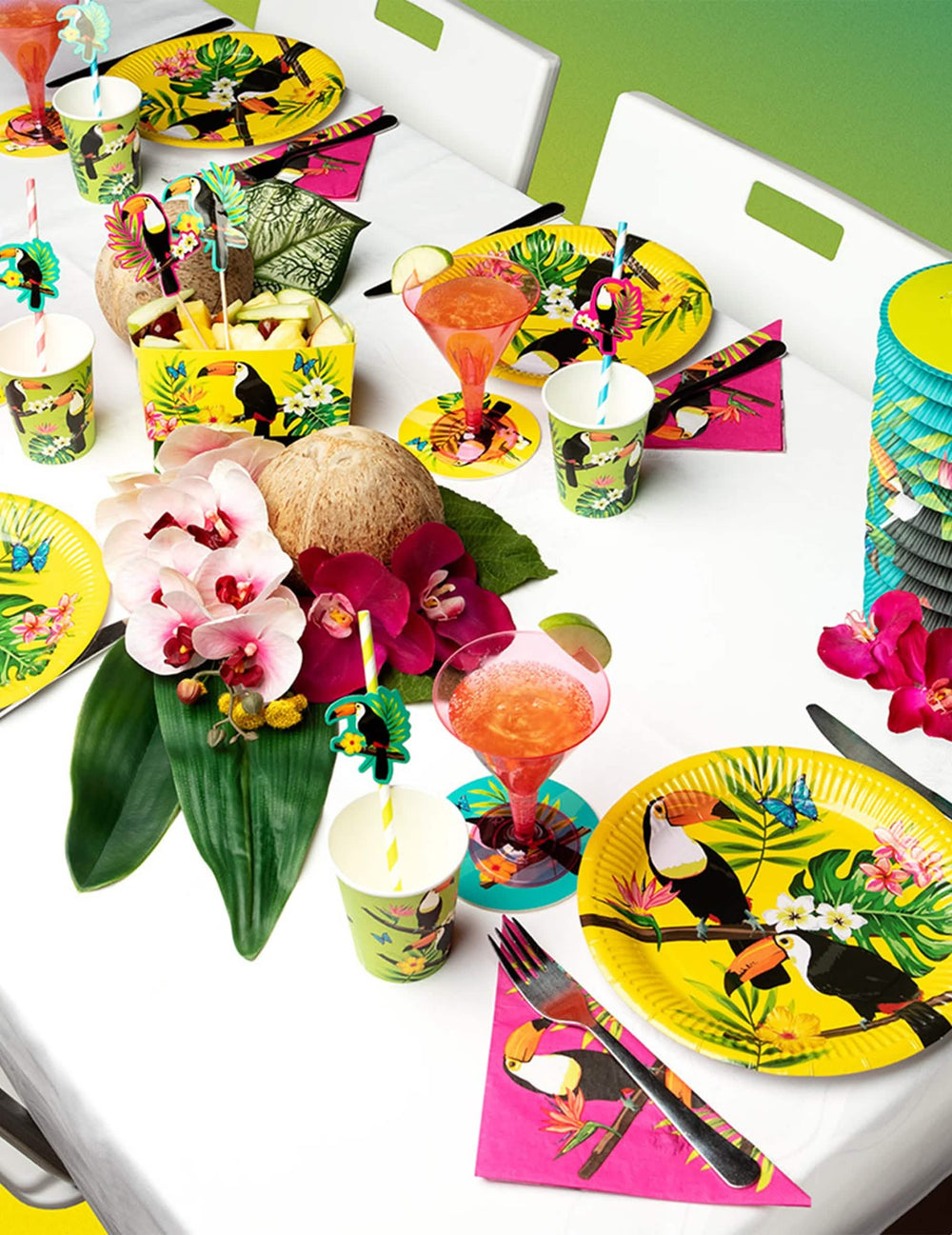 Staging on a party table cardboard toucan cups