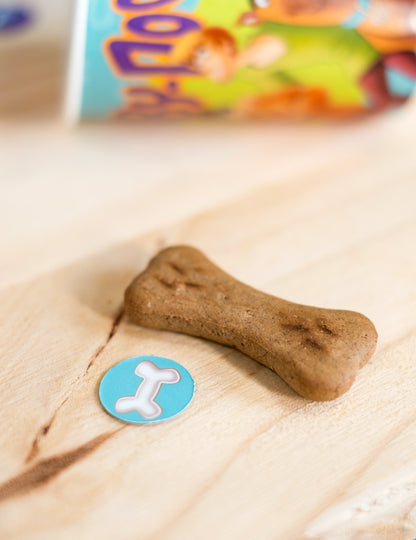 Détail du motif os et biscuit des confettis Scooby-Doo
