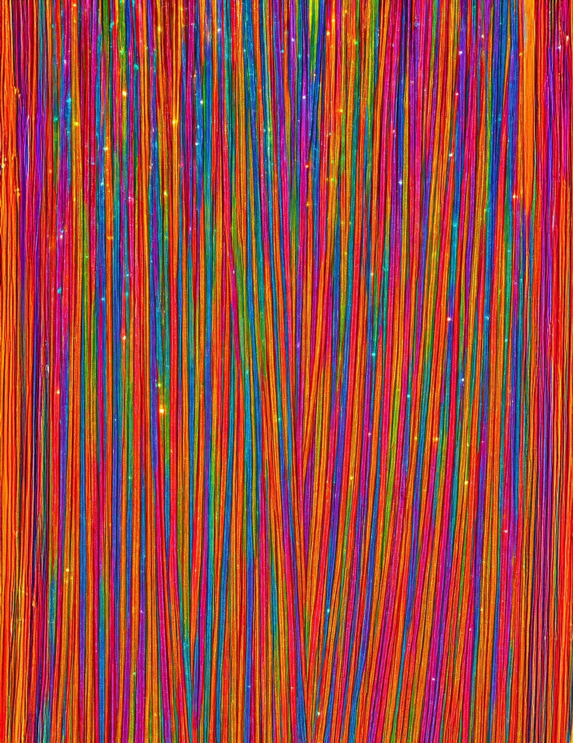 Gros plan sur la texture des 3 mèches brillantes multicolores pour femme à paillettes