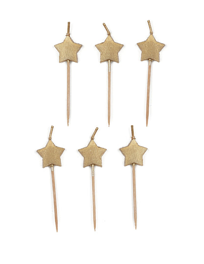 6 sviečok na zlatých ozdobách na tortu v tvare hviezdy