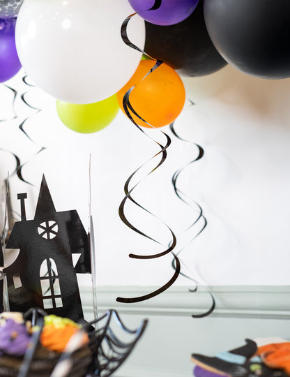 8 čiernych špirálových dekorácií