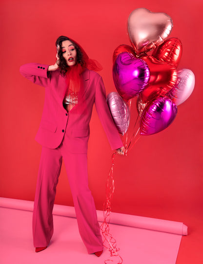 Mise en situation du ballon aluminium cœur pour fête rose gold métallisé