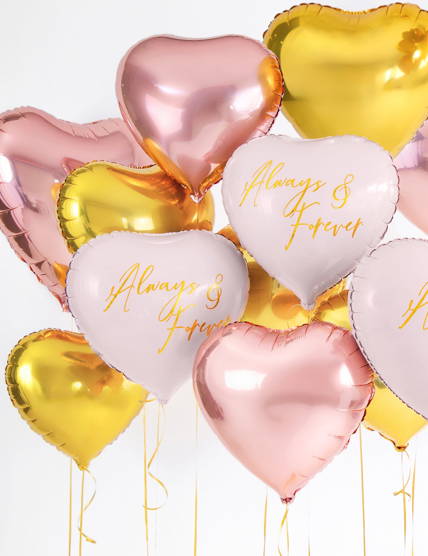 Bouquet de plusieurs exemplaires du ballon aluminium cœur pour fête rose gold métallisé