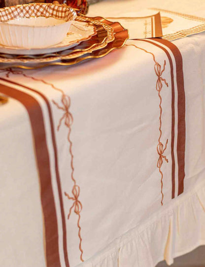 Behúň na stôl Krásne uzly z látky krémovej auburn a pálenej zeme 28 cm x 3 m