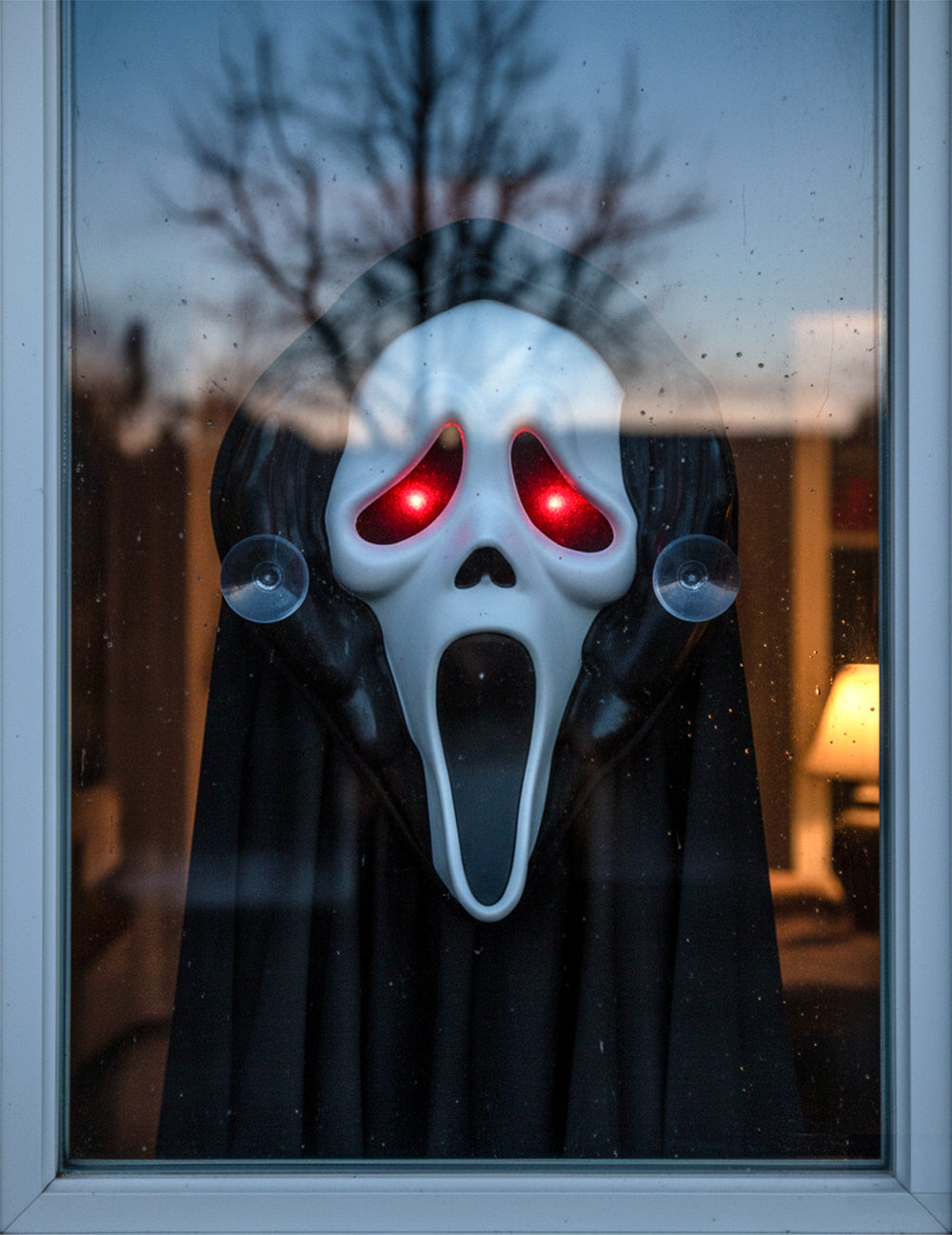 Décoration de fenêtre Scream pour Halloween lumineuse noire et blanche aux yeux rouges