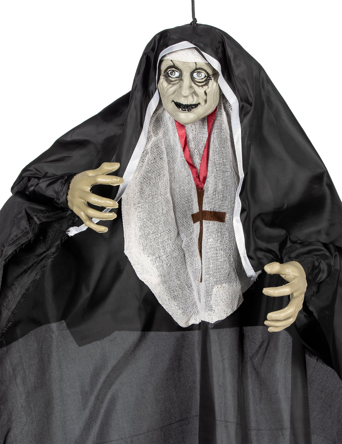 Gros plan sur le visage et les mains de la décoration lumineuse religieuse zombie
