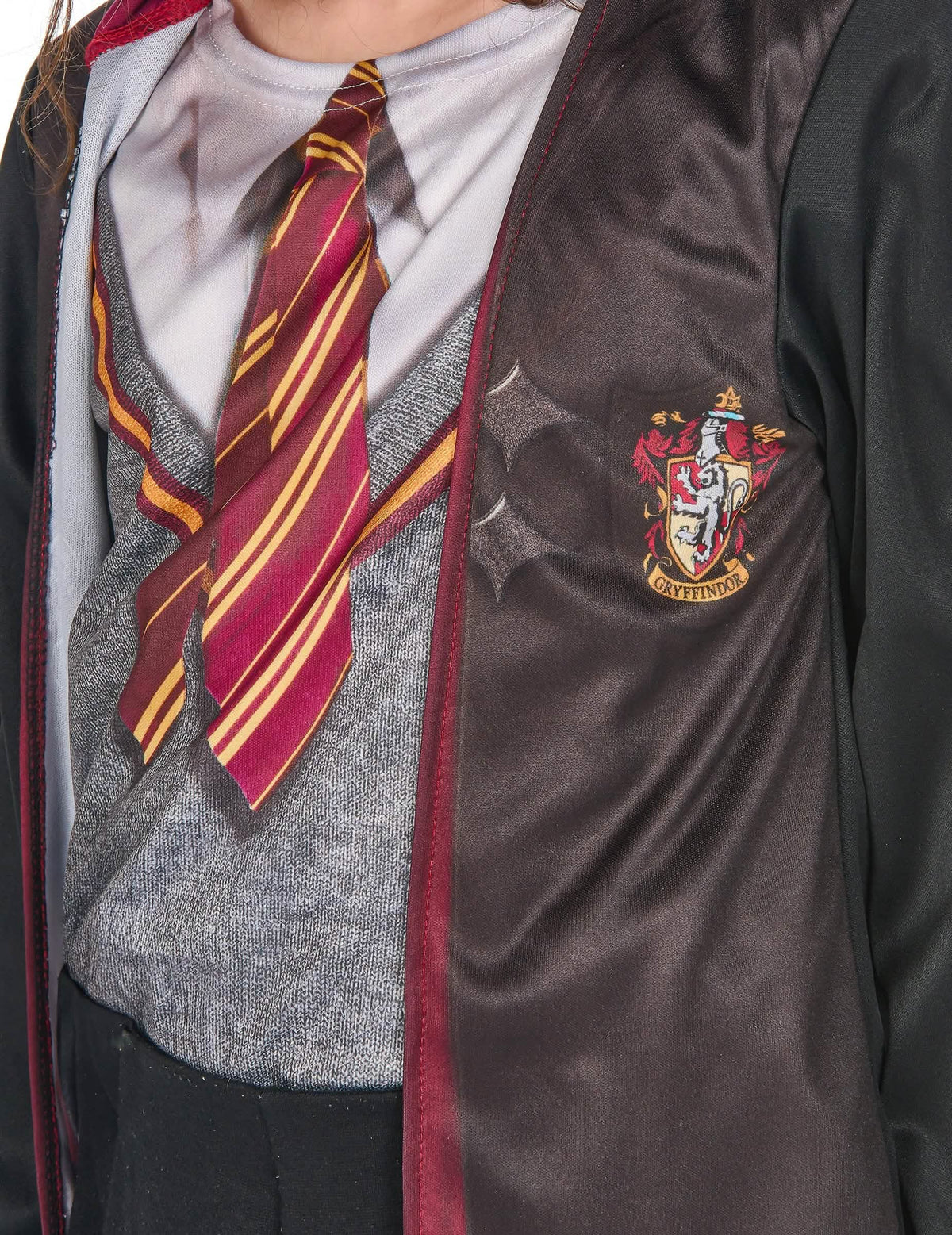 Detail gryffindorského erbu na šatách kostýmu s doplnky Harry Potter™