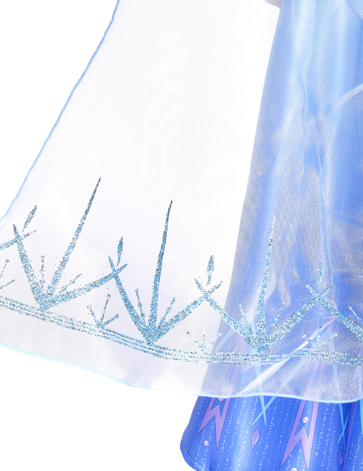 Détail du bas du voile avec motifs pailletés du déguisement Elsa Reine des Neiges 2 deluxe