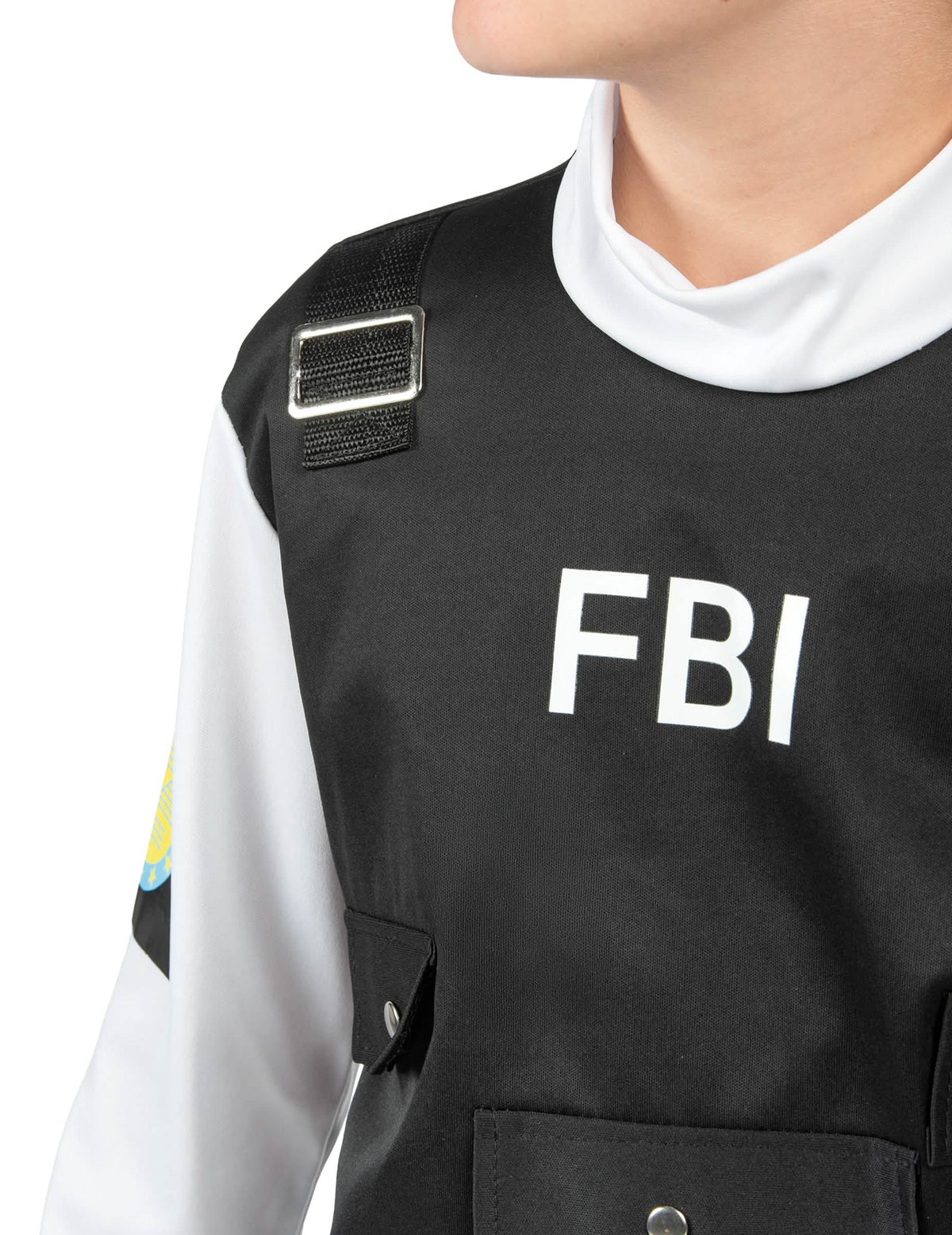 Detail nápisu FBI na vesti detského kostýmu FBI