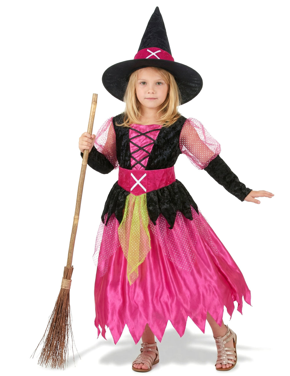 Balai de sorcière tenu avec le déguisement de sorcière pour fille
