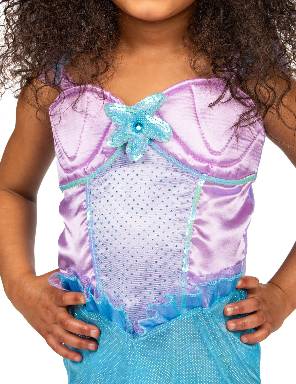 Détail de l'étoile de mer à paillettes du bustier du déguisement de sirène pour fille