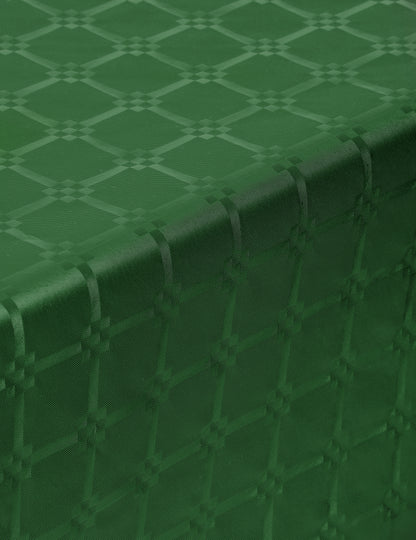 Détail de la texture damassée de la nappe en rouleau papier damassé pour fête vert foncé