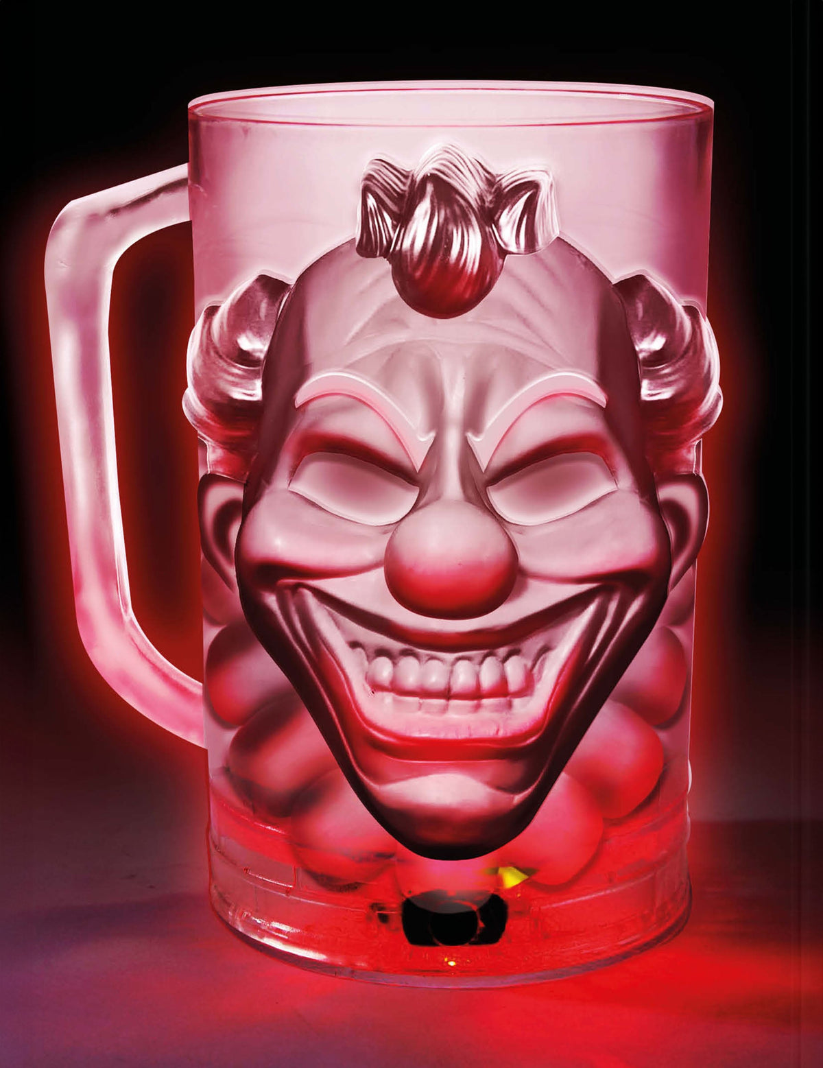 Détail du visage éclairé par les LED de la pinte clown terrifiant