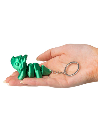Figurine de triceratops vert du porte-clés petits animaux colorés et articulés