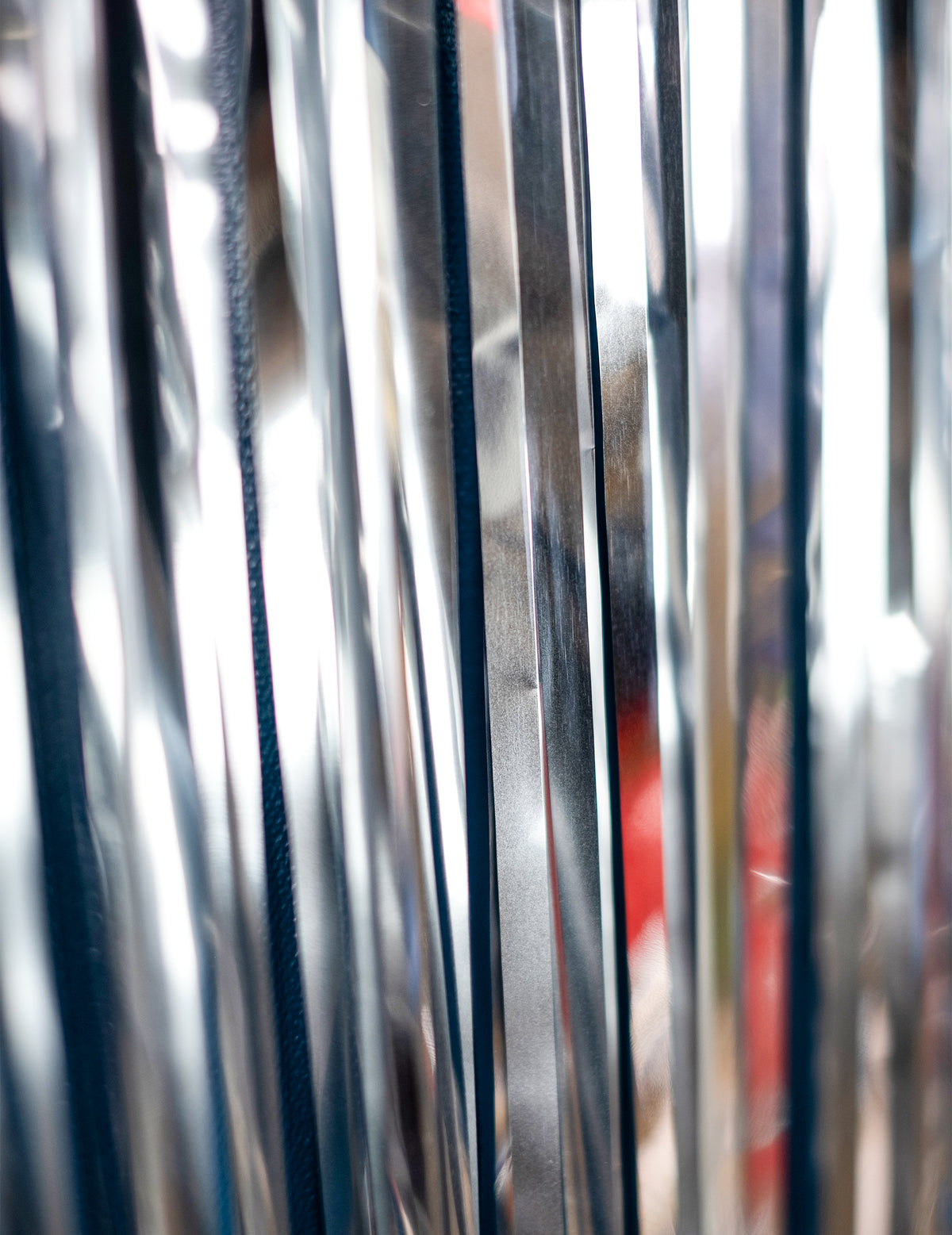 Détail des bandes du rideau scintillant pour fête argent métallique