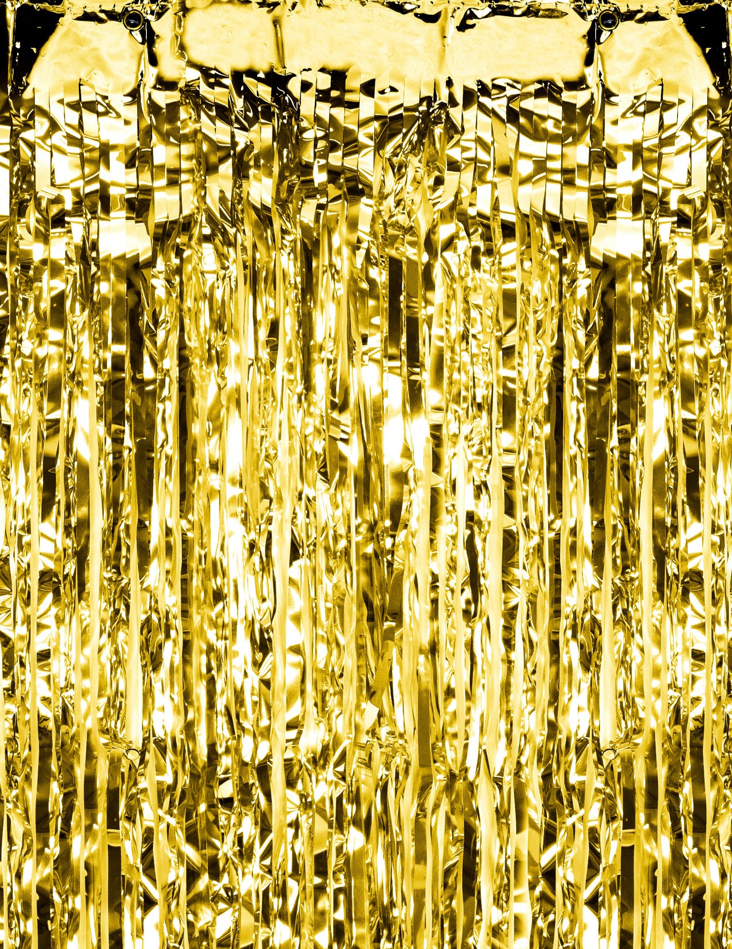 Detail na zlaté třásně trblietavého závesu na oslavu