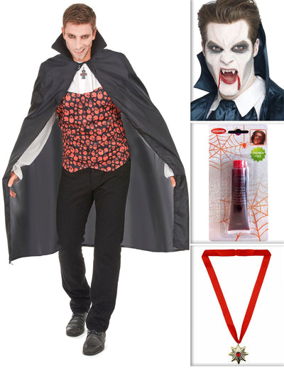 Sada upíra s plášťom, zubami, falošnou krvou a medailónom na Halloween