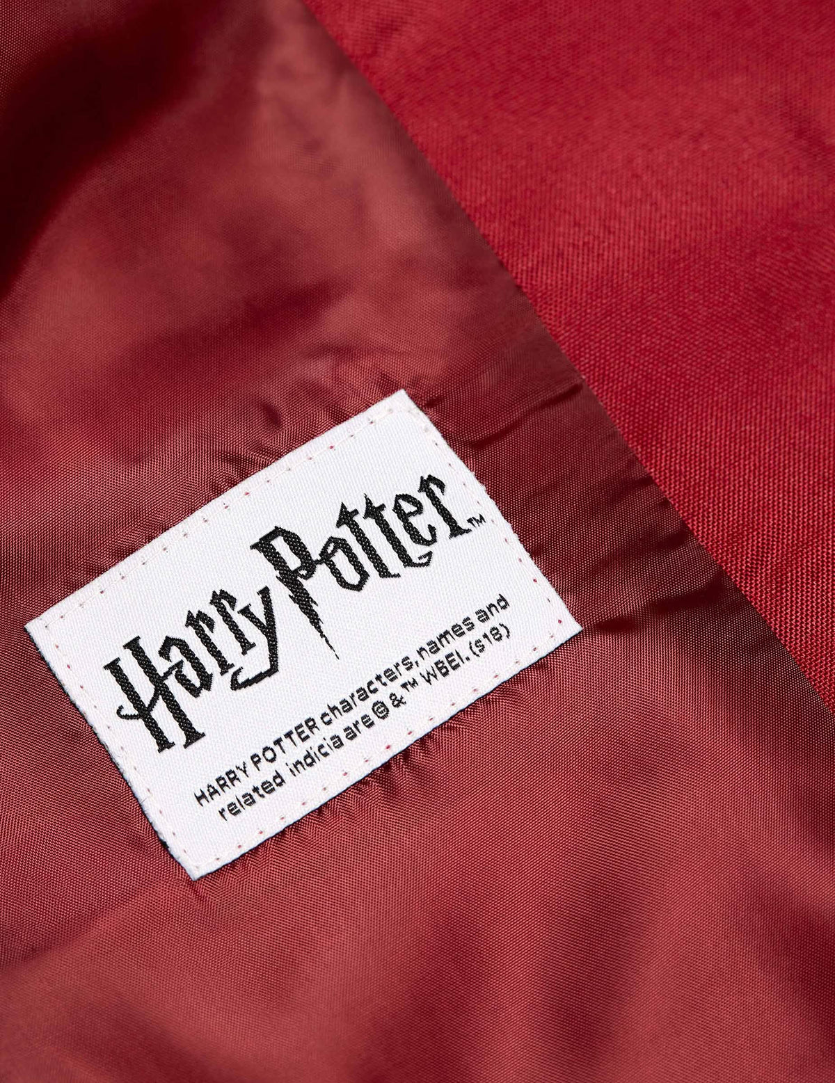 Detail štítku bundy Harry Potter Mrs. Gryffondor pre ženu Suitmeister